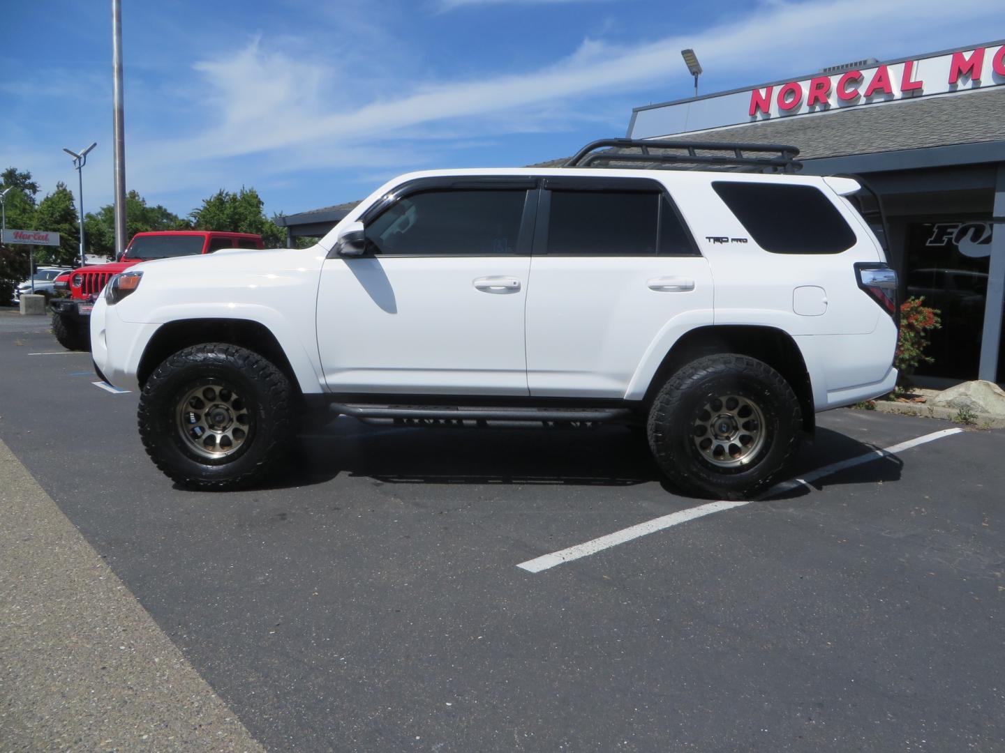 2019 White /black Toyota 4Runner TRD PRO 4WD (JTEBU5JR9K5) with an 4.0L V6 DOHC 24V engine, 5A transmission, located at 2630 Grass Valley Highway, Auburn, CA, 95603, (530) 508-5100, 38.937893, -121.095482 - TRD PRO 4Runner sitting on 17" SCS wheels, BFG KO2 tires, Tyger running boards, Roof Rack with ladder, and window tint. - Photo#7